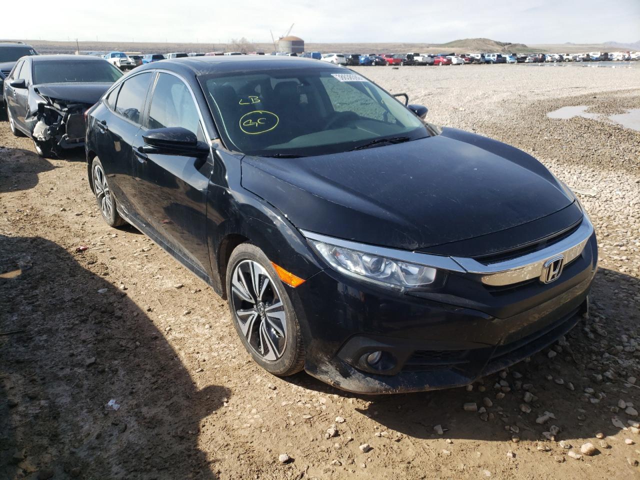 HONDA CIVIC EX 2016 with VIN 19XFC1F33GE041443 - Photo from auction