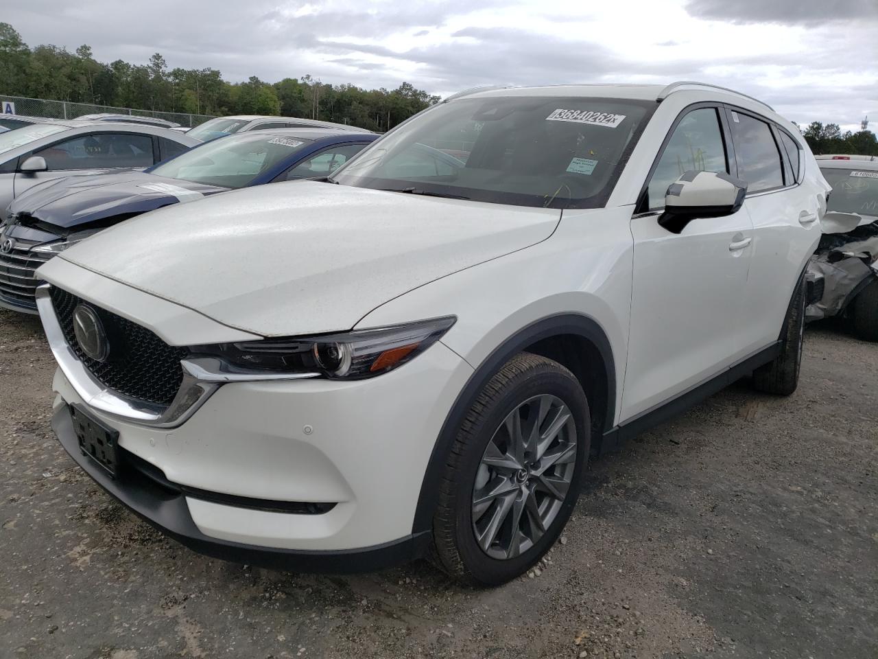 Photo 2 from auction – 2021 MAZDA CX-5 SIGNA with VIN JM3KFBEY0M0449144