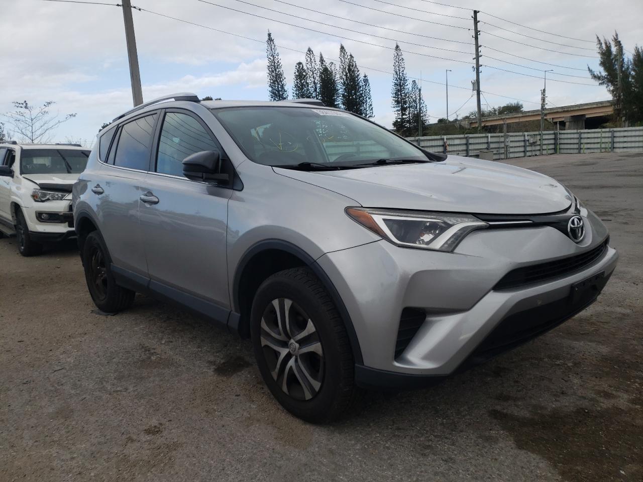 TOYOTA RAV4 LE 2016 with VIN 2T3ZFREV8GW242328 - Photo from auction