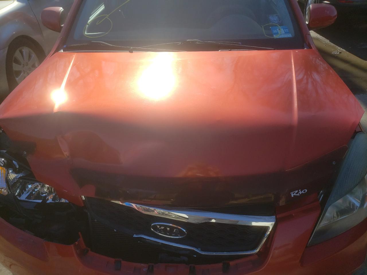 Photo 7 from auction – 2010 KIA RIO LX with VIN KNADH5A34A6647920