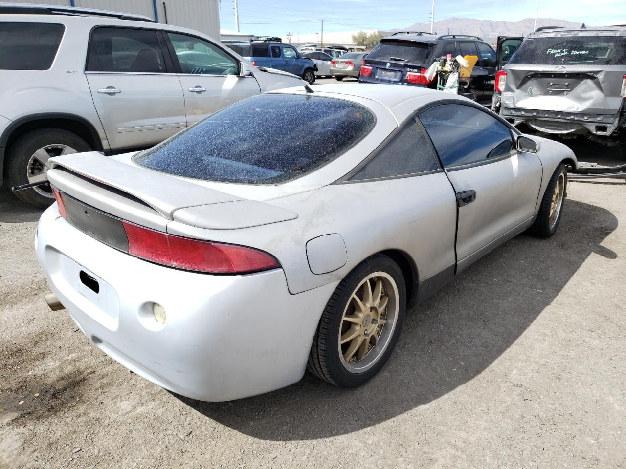 Photo 4 from auction – 1998 MITSUBISHI ECLIPSE RS with VIN 4A3AK34Y0WE120325