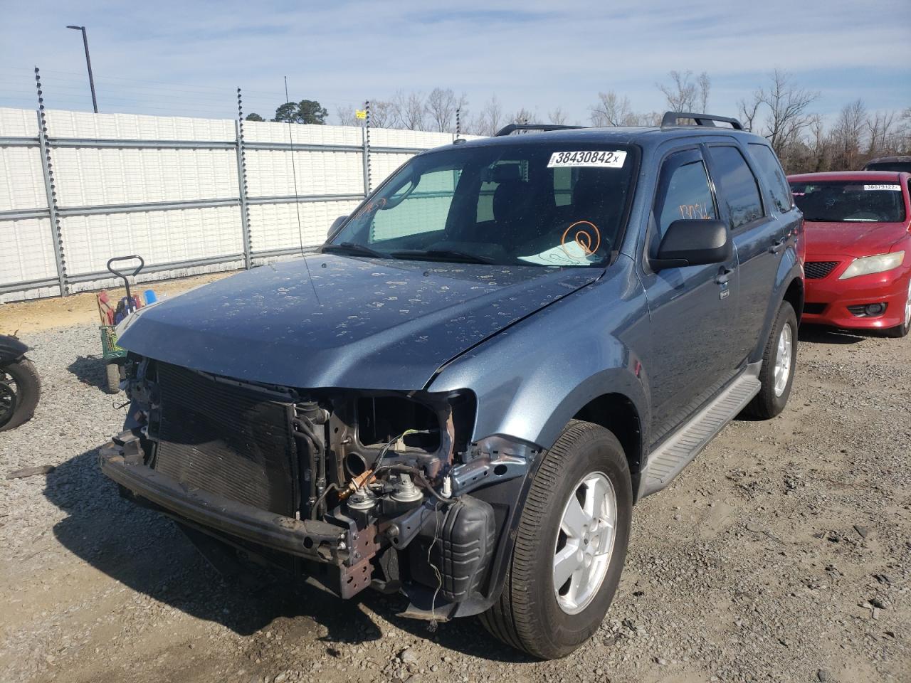 Photo 2 from auction – 2010 FORD ESCAPE XLT with VIN 1FMCU0D76AKD24550