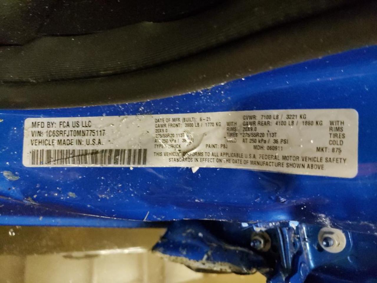 Photo 10 from auction – 2021 RAM 1500 LARAM with VIN 1C6SRFJT0MN775117