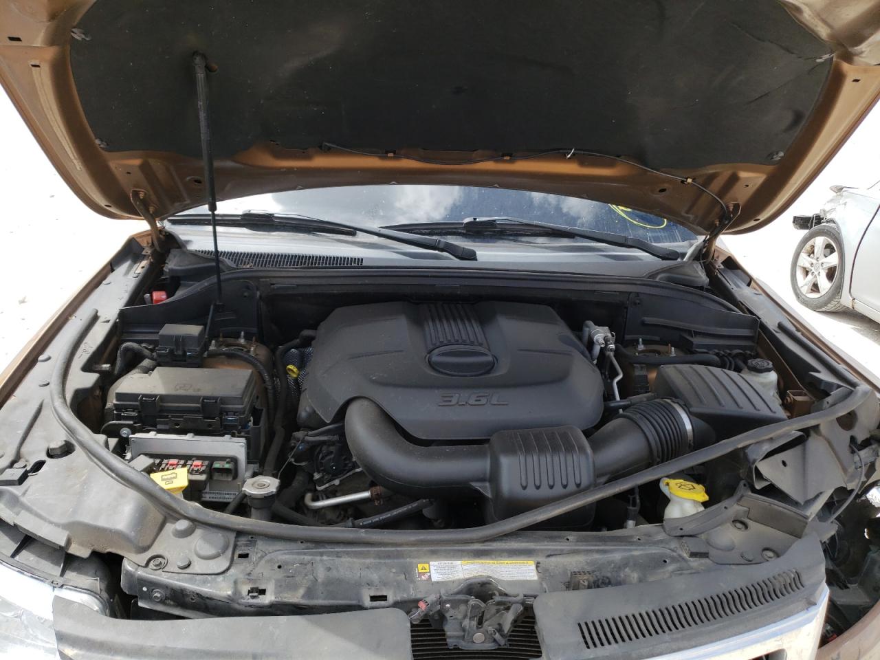 Photo 7 from auction – 2011 JEEP GRAND CHER with VIN 1J4RR4GG9BC645782