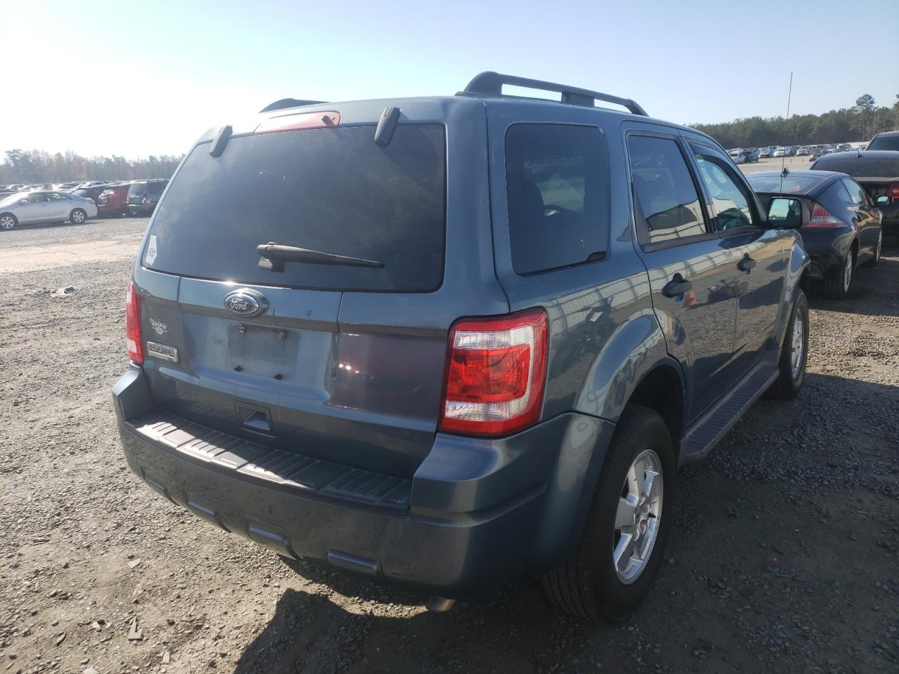 Foto 4 de la subasta – 2010 FORD ESCAPE XLT con VIN 1FMCU0D76AKD24550