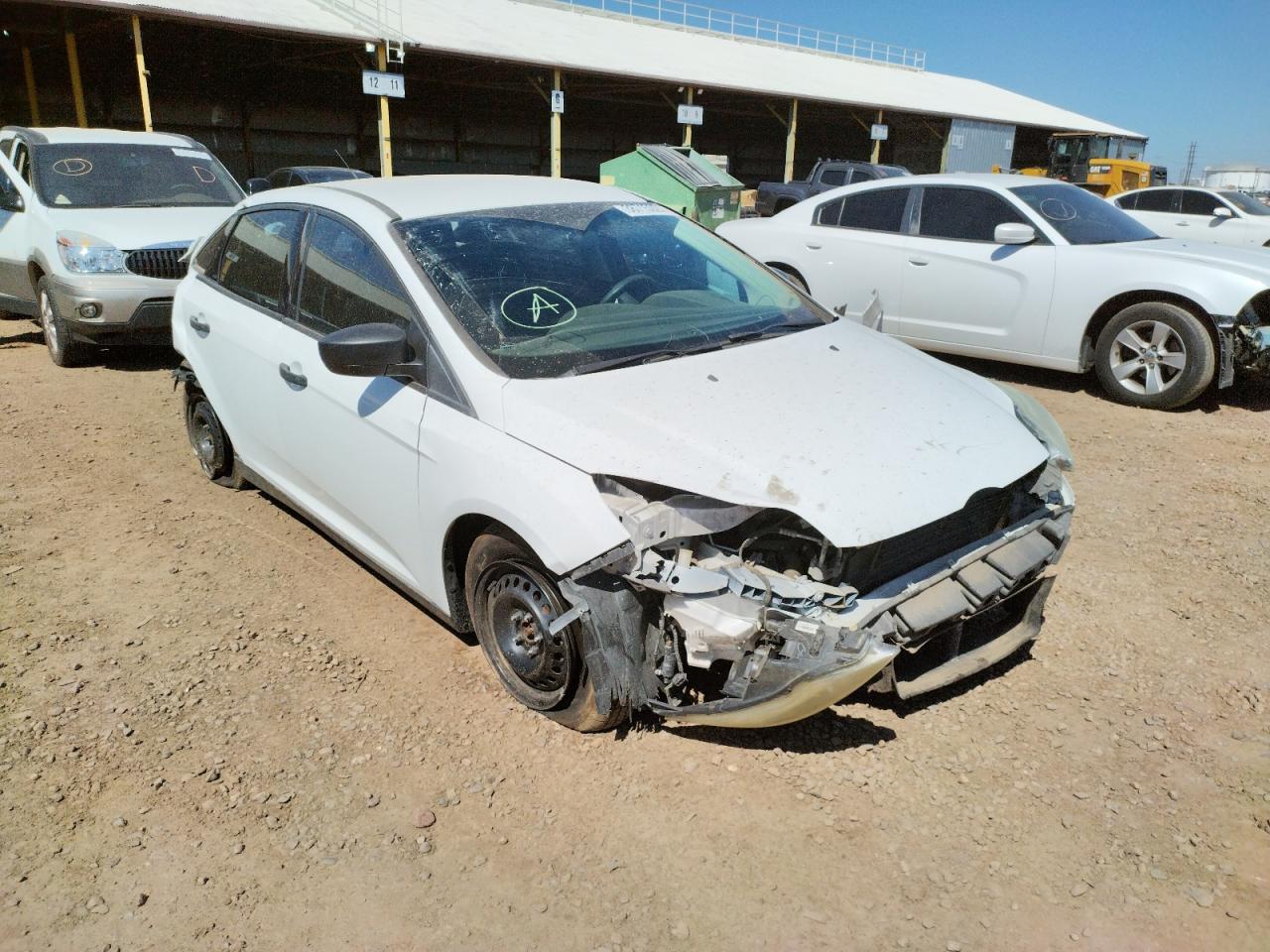 FORD FOCUS S 2014 with VIN 1FADP3E25EL282849 - Photo from auction