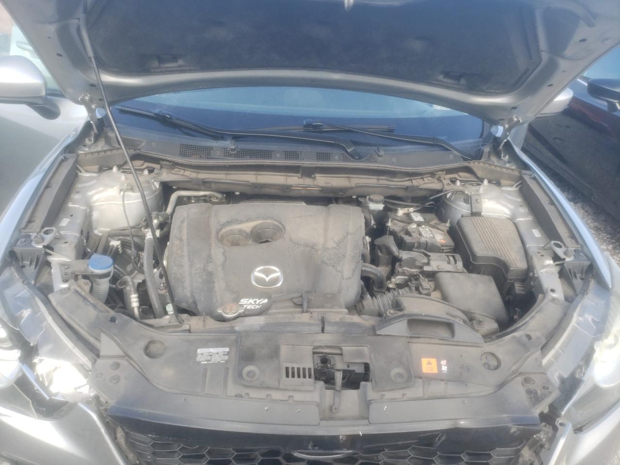 Photo 7 from auction – 2014 MAZDA CX-5 TOURI with VIN JM3KE2CY0E0384660