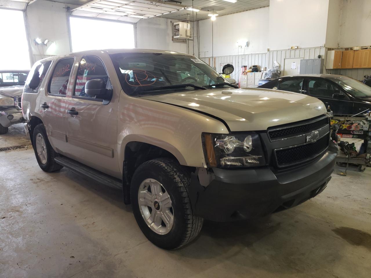 CHEVROLET TAHOE C150 2010 with VIN 1GNMCAE08AR182607 - Photo from auction