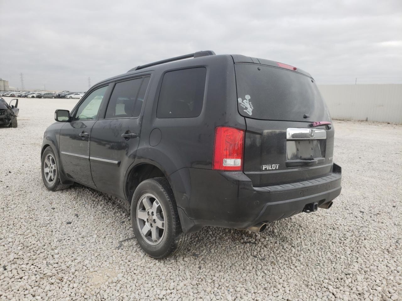 Photo 3 from auction – 2010 HONDA PILOT TOUR with VIN 5FNYF4H89AB017496
