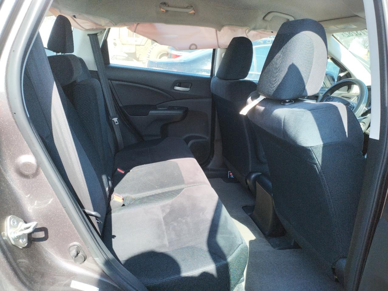 Photo 6 from auction – 2012 HONDA CR-V LX with VIN 5J6RM4H33CL064659