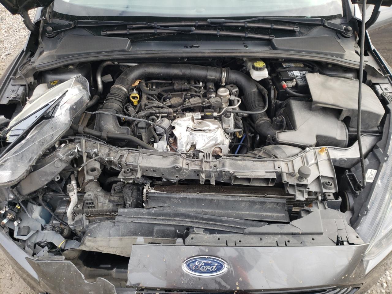 Photo 7 from auction – 2018 FORD FOCUS SE with VIN 1FADP3FEXJL235030