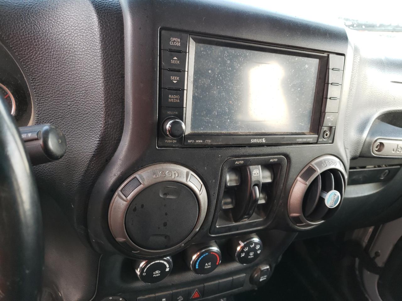 Photo 9 from auction – 2011 JEEP WRANGLER U with VIN 1J4BA3H14BL595872