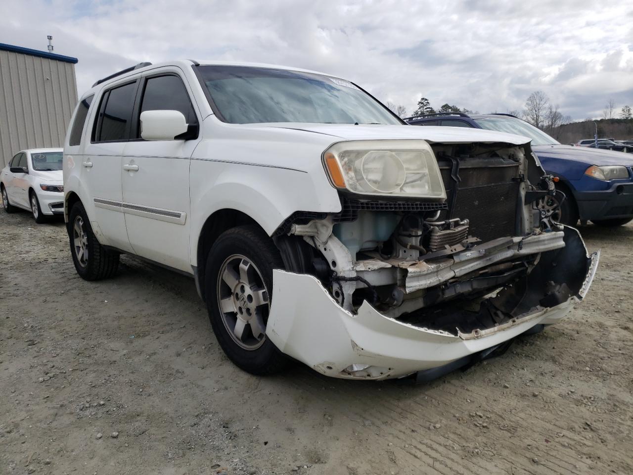 HONDA PILOT TOUR 2009 with VIN 5FNYF38869B010799 - Photo from auction