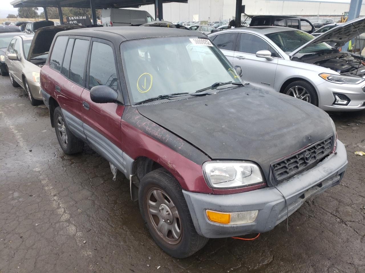 TOYOTA RAV4 1998 with VIN JT3GP10V6W7033231 - Photo from auction