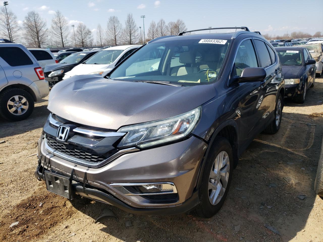 Photo 2 from auction – 2015 HONDA CR-V EXL with VIN 5J6RM4H73FL039039