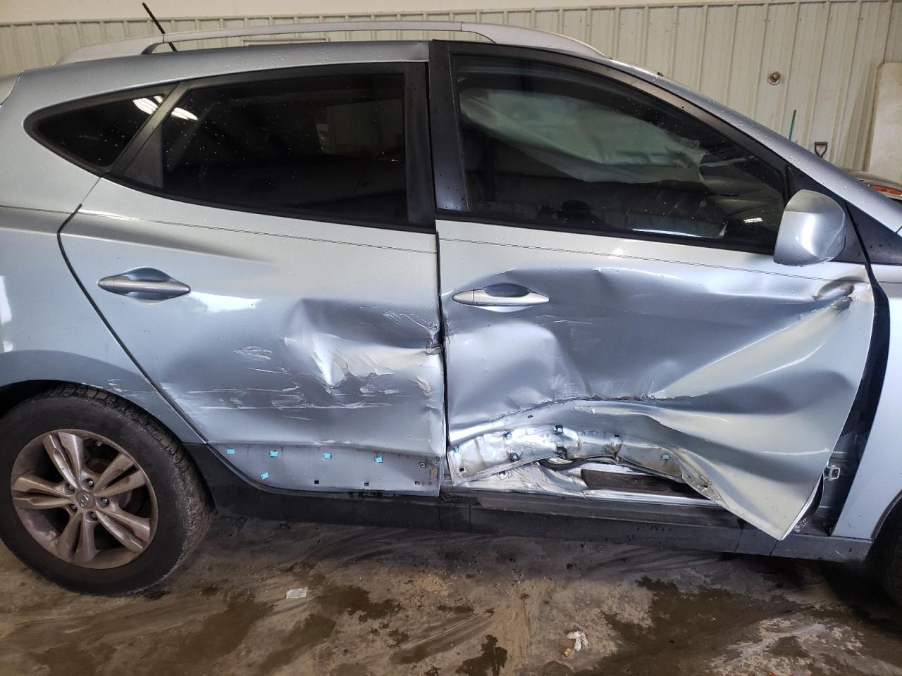 Photo 9 from auction – 2011 HYUNDAI TUCSON GLS with VIN KM8JU3AC5BU305701