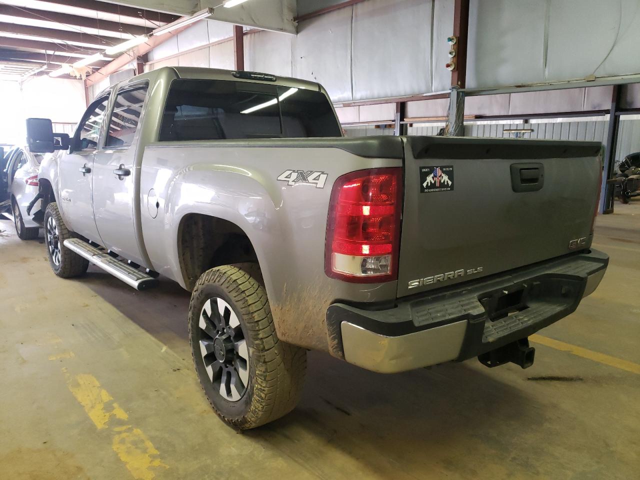 Photo 3 from auction – 2014 GMC SIERRA K25 with VIN 1GT120E83EF138925