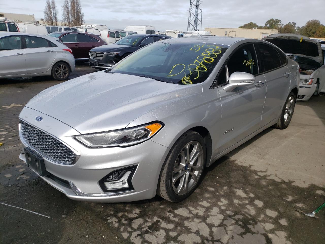 Photo 2 from auction – 2019 FORD FUSION TIT with VIN 3FA6P0RU4KR105709