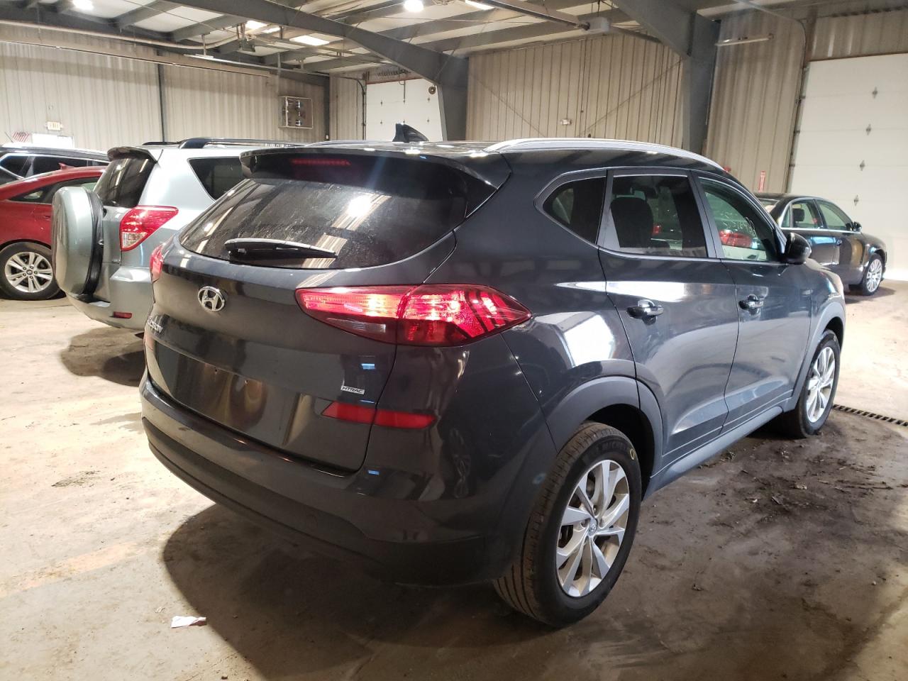 Photo 4 from auction – 2020 HYUNDAI TUCSON LIM with VIN KM8J3CA42LU176765