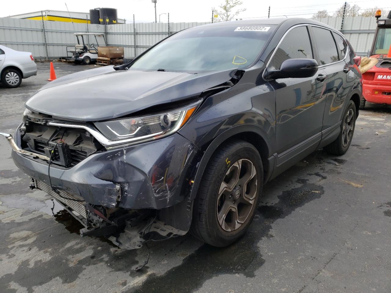 Photo 2 from auction – 2017 HONDA CR-V EX with VIN 7FARW1H57HE047829