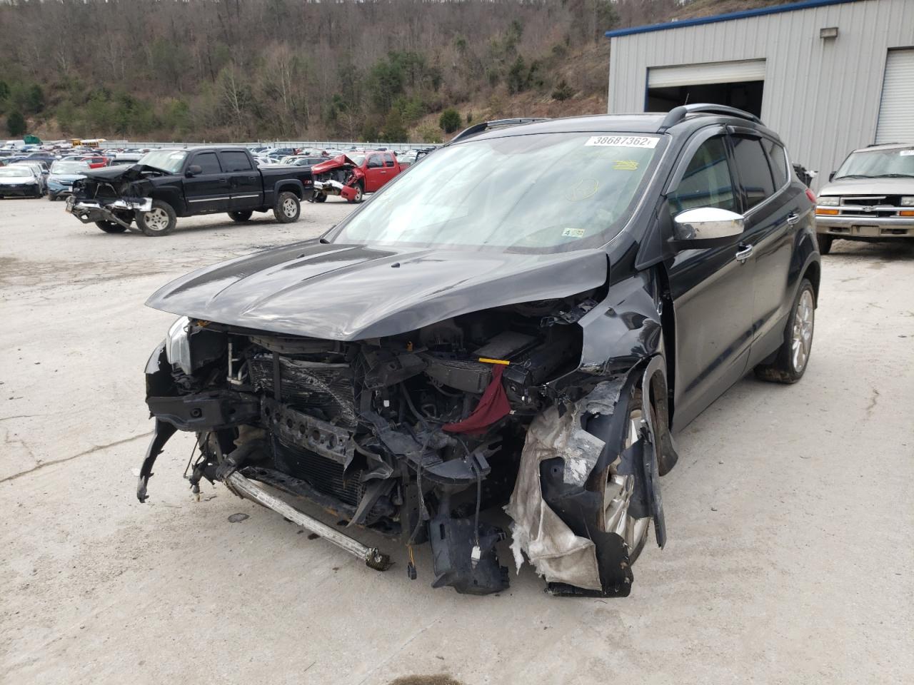 Photo 2 from auction – 2016 FORD ESCAPE SE with VIN 1FMCU9GX4GUB13084