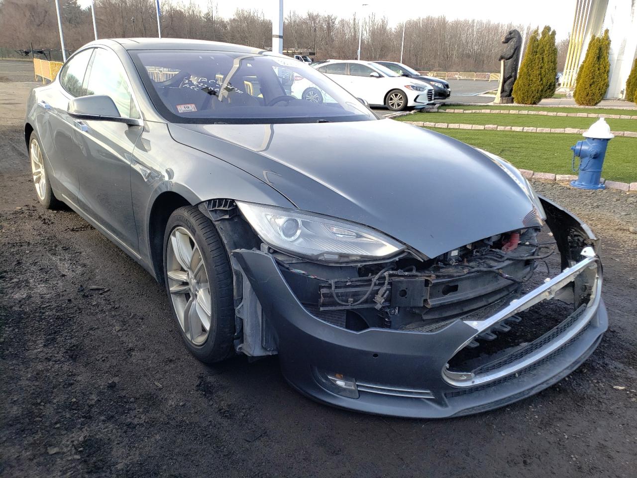 TESLA MODEL S 2014 with VIN 5YJSA1H12EFP41820 - Photo from auction