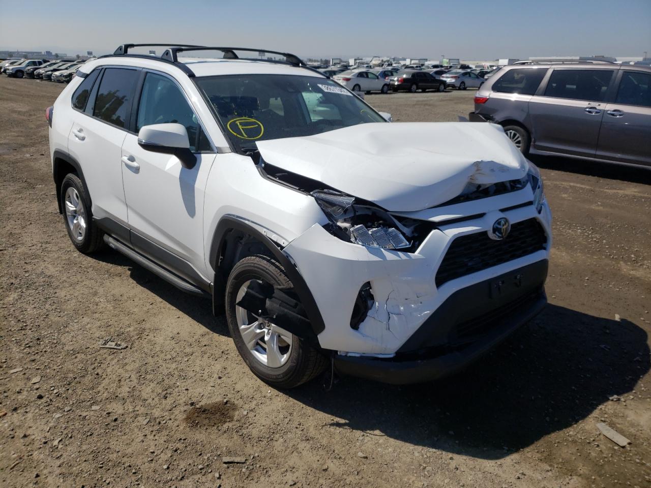 TOYOTA RAV4 XLE 2021 with VIN 2T3W1RFV8MC125054 - Photo from auction