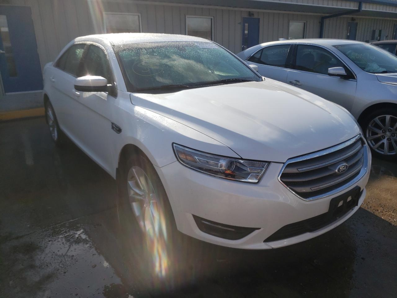 FORD TAURUS SEL 2013 with VIN 1FAHP2E80DG220525 - Photo from auction