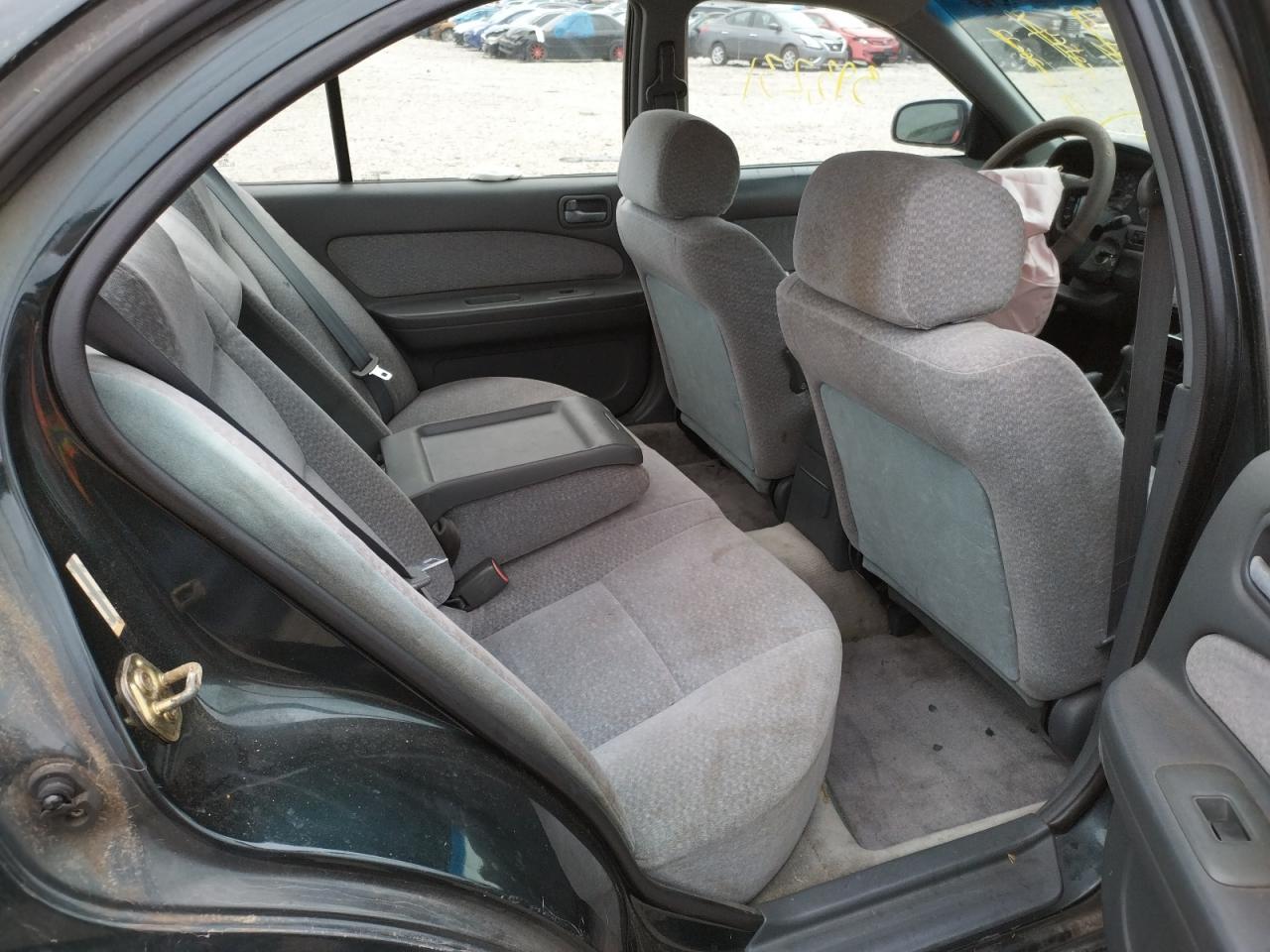 Photo 6 from auction – 1995 NISSAN MAXIMA GLE with VIN JN1CA21D4ST013703