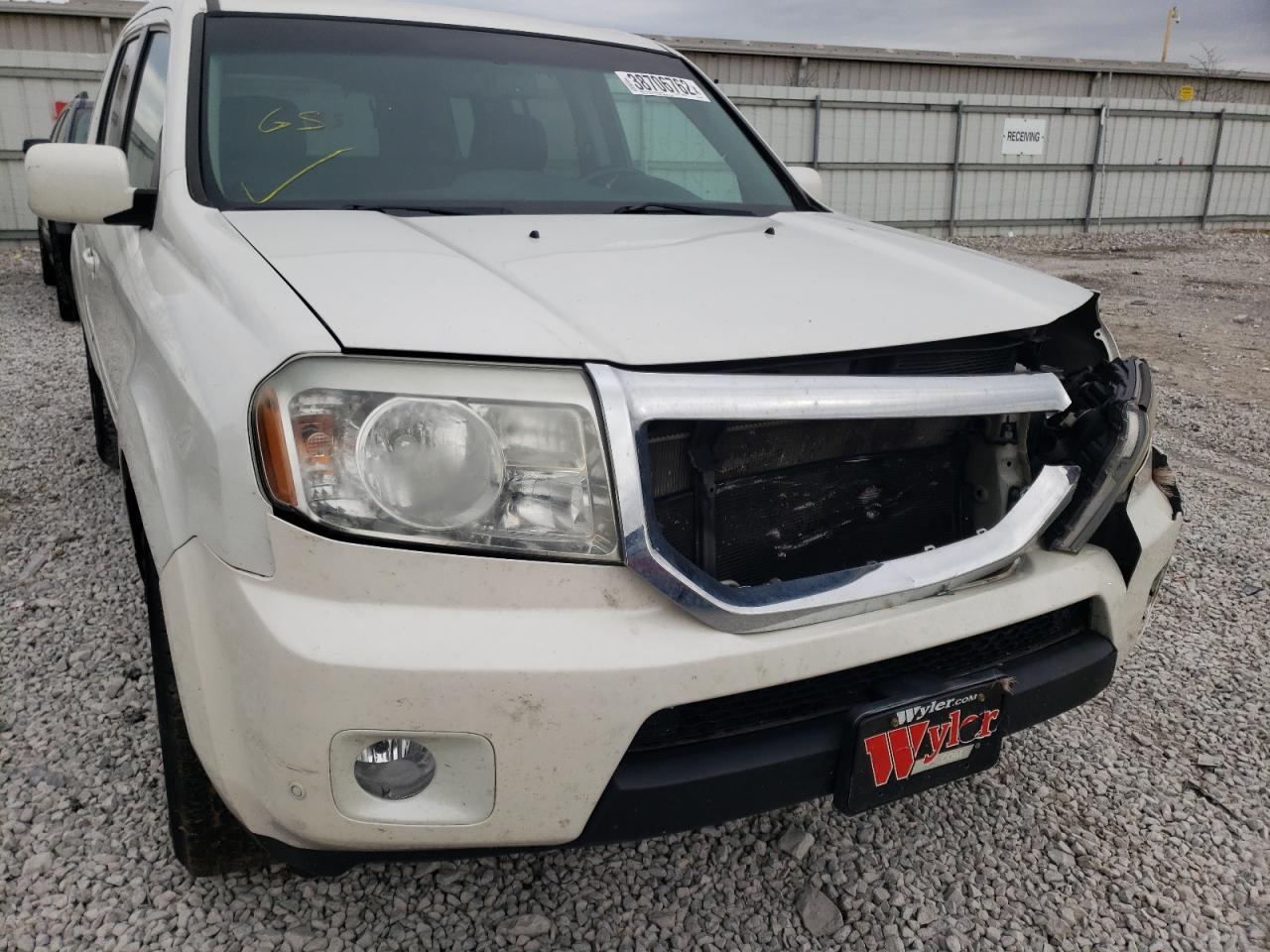 Photo 9 from auction – 2011 HONDA PILOT TOUR with VIN 5FNYF4H95BB026304