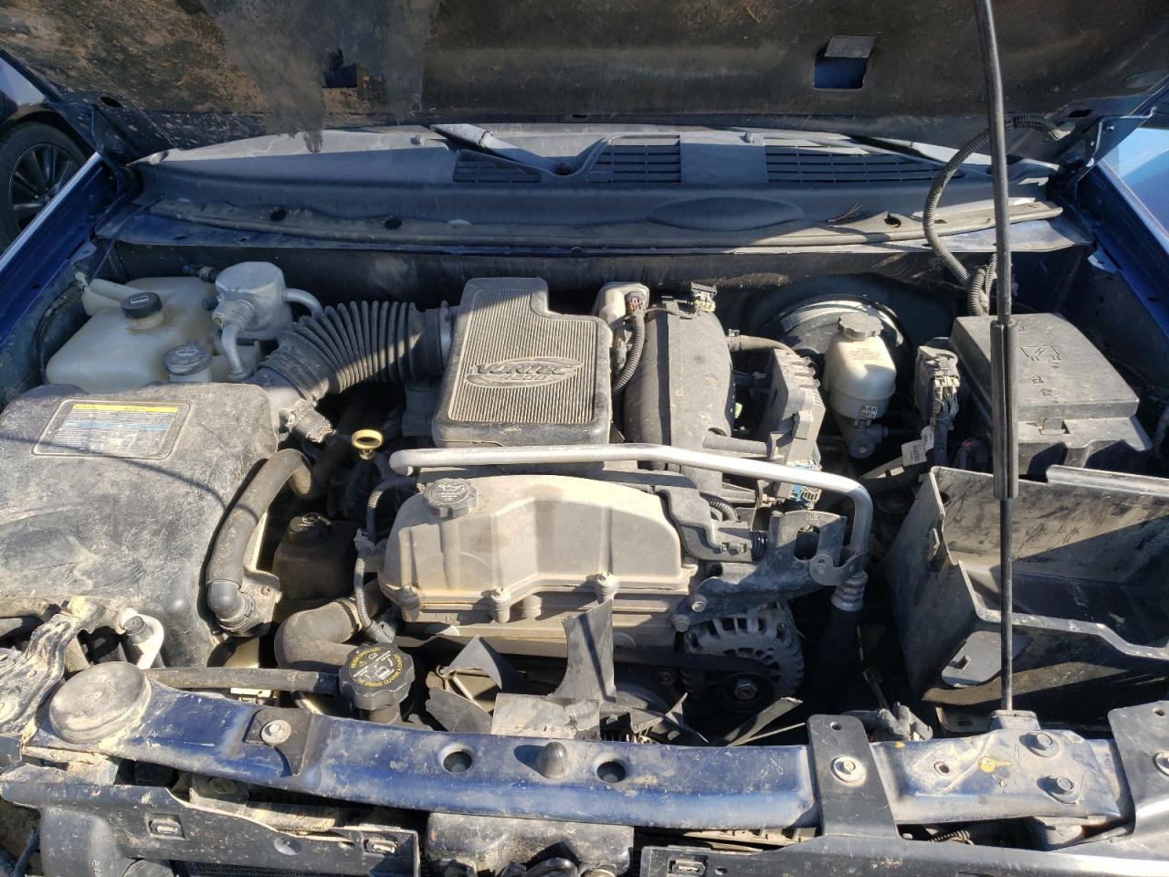 Photo 7 from auction – 2006 GMC ENVOY with VIN 1GKDT13S262223038