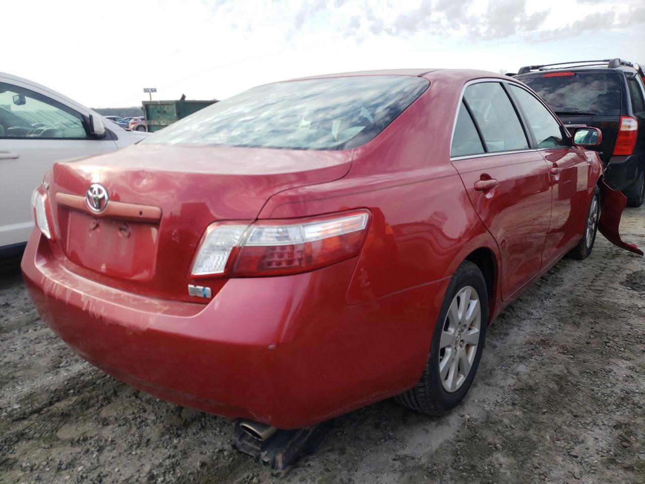 Photo 4 from auction – 2007 TOYOTA CAMRY HYBR with VIN JTNBB46K173000936