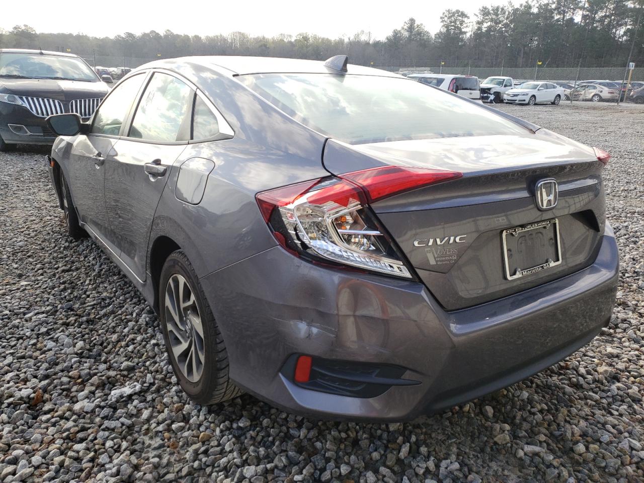 Photo 3 from auction – 2018 HONDA CIVIC EX with VIN 19XFC2F76JE002863