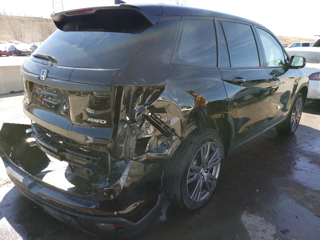 Photo 4 from auction – 2020 HONDA PASSPORT E with VIN 5FNYF8H53LB016795