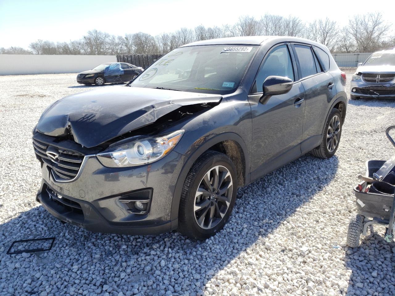 Photo 2 from auction – 2016 MAZDA CX-5 GT with VIN JM3KE2DY0G0772084