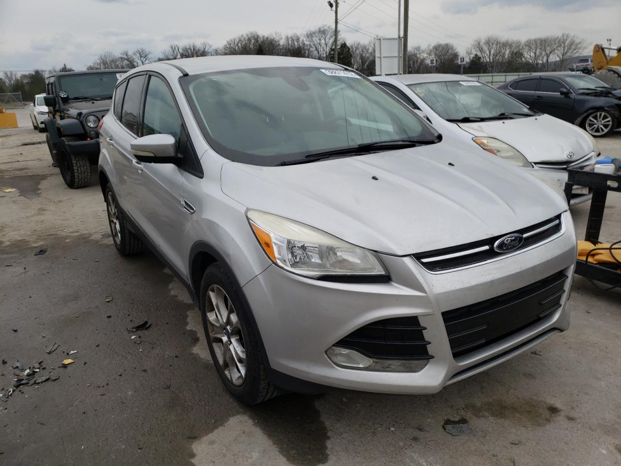 FORD ESCAPE SEL 2013 with VIN 1FMCU0HX1DUB10309 - Photo from auction