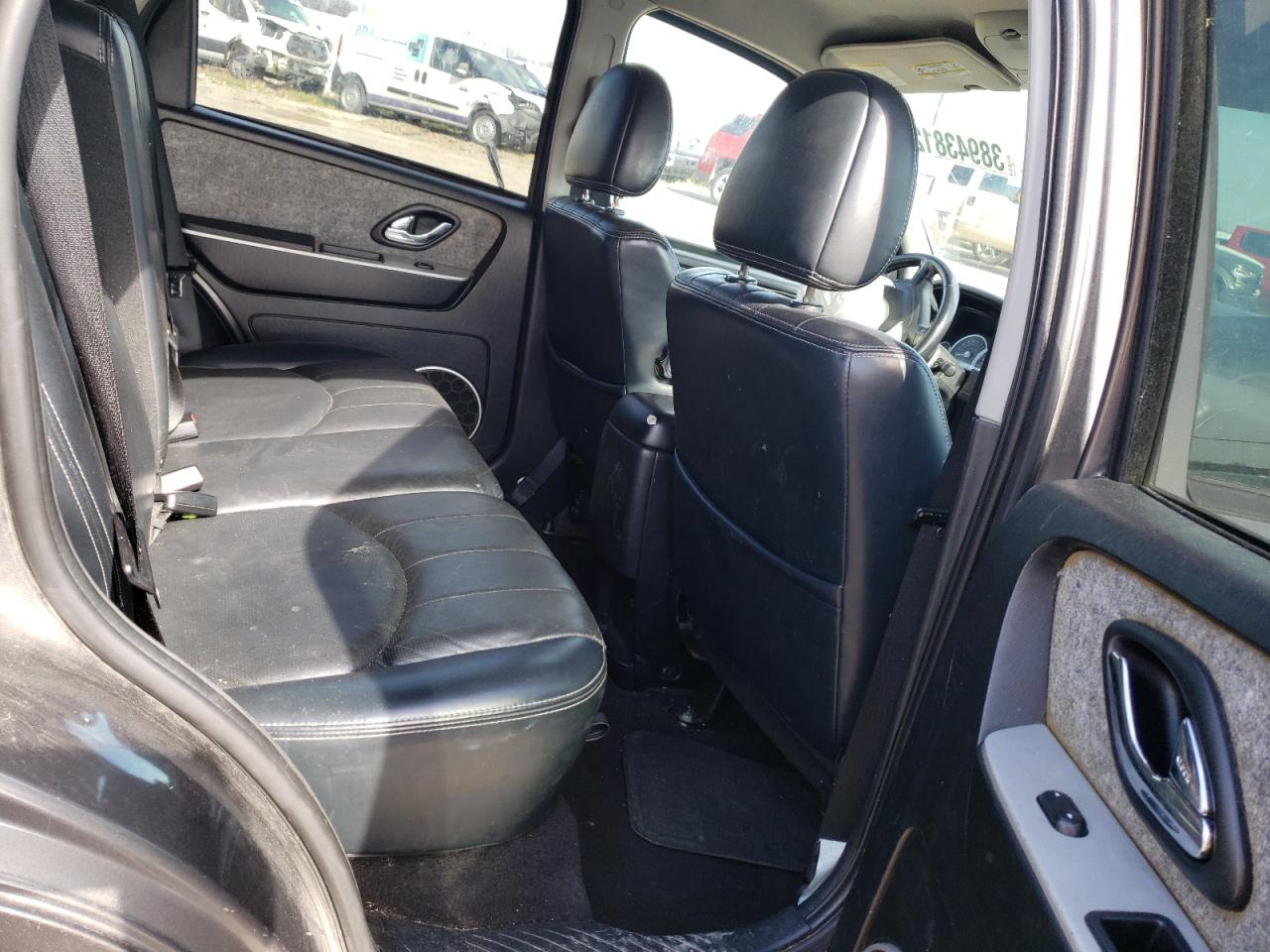 Photo 6 from auction – 2006 MERCURY MARINER with VIN 4M2YU57116KJ07648