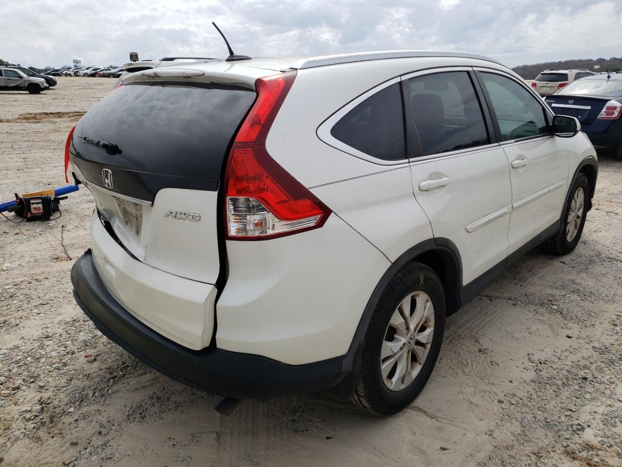 Photo 4 from auction – 2014 HONDA CR-V EXL with VIN 5J6RM4H78EL016094