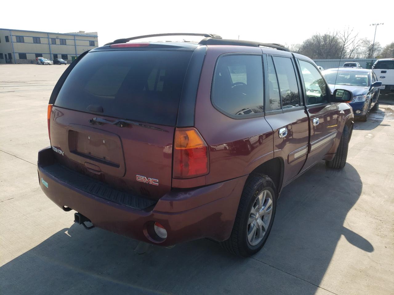 Photo 4 from auction – 2004 GMC ENVOY with VIN 1GKDS13S142337418