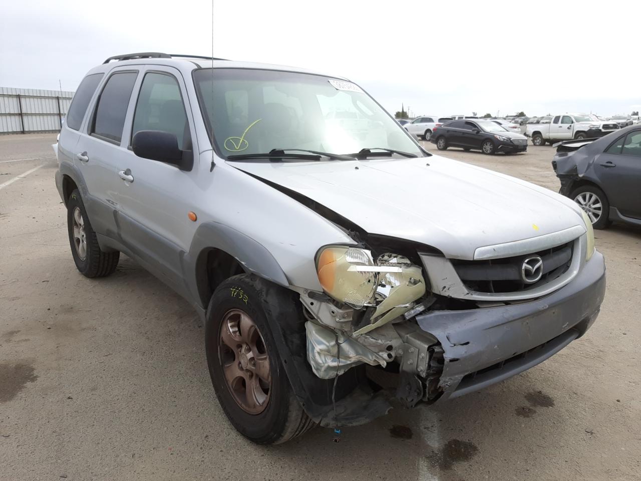 MAZDA TRIBUTE LX 2002 with VIN 4F2CU09142KM51694 - Photo from auction