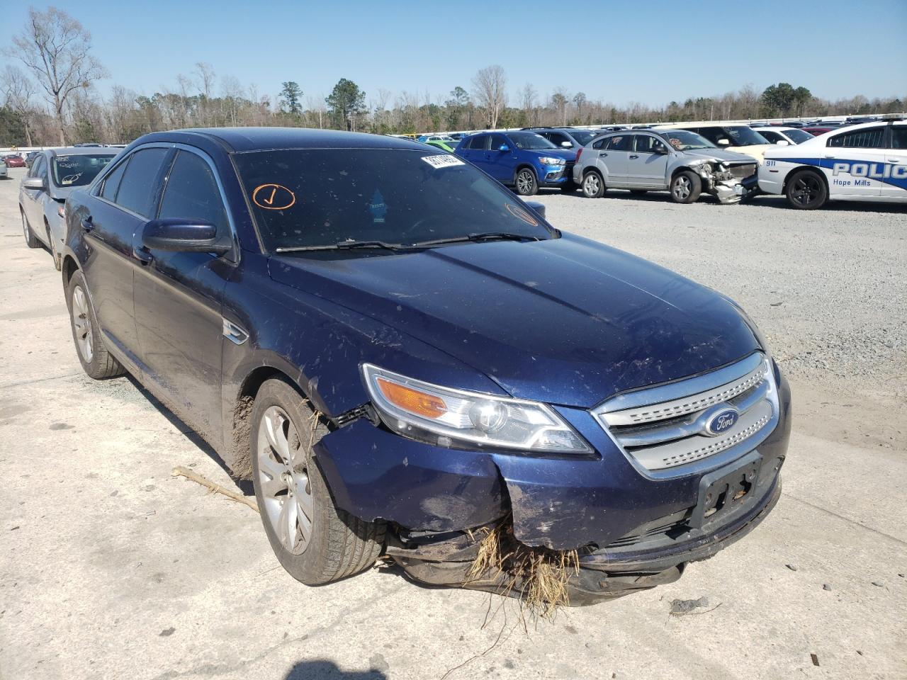 FORD TAURUS SEL 2011 with VIN 1FAHP2EW1BG114029 - Photo from auction