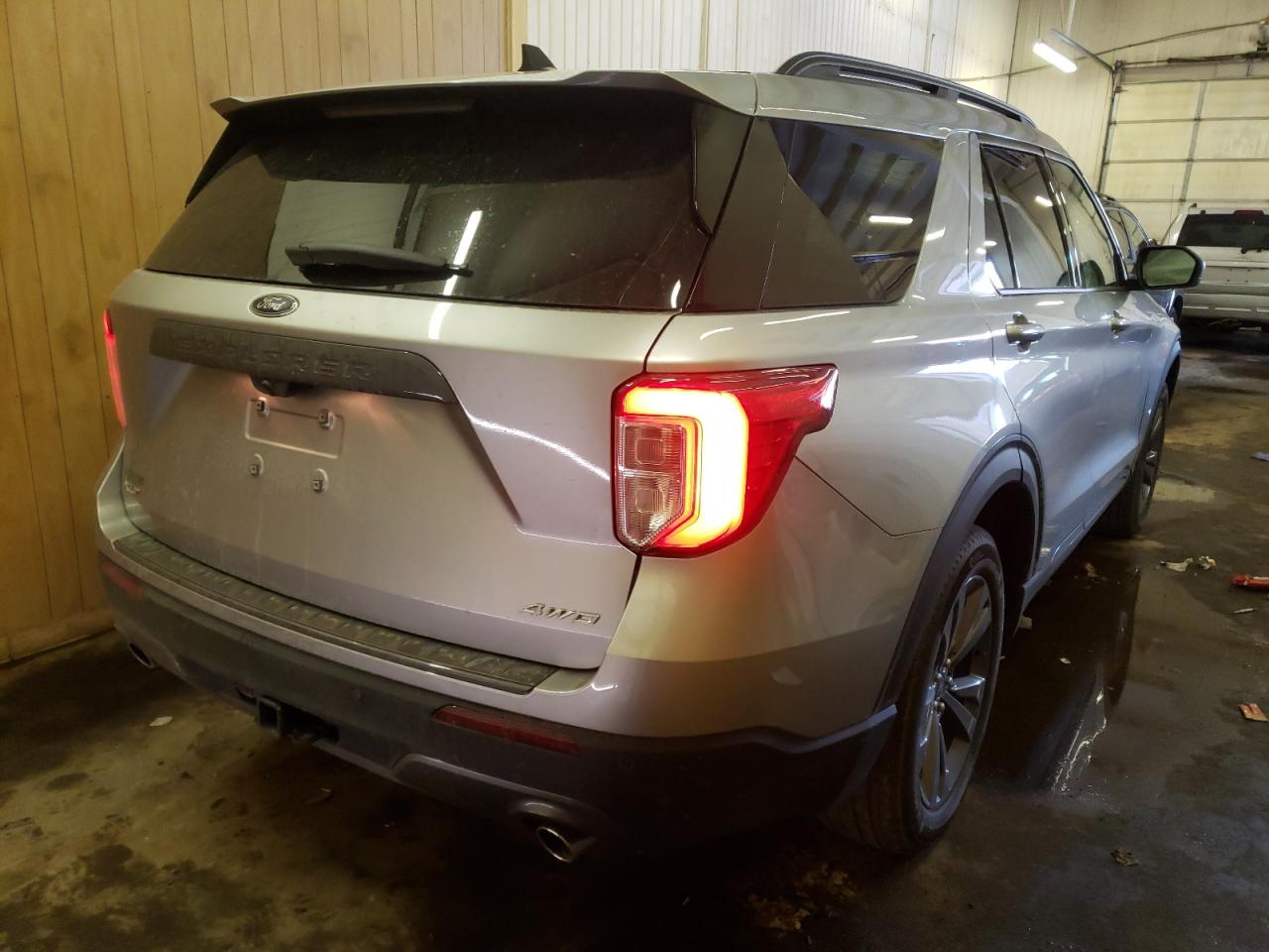 Photo 4 from auction – 2021 FORD EXPLORER X with VIN 1FMSK8DH9MGC10946