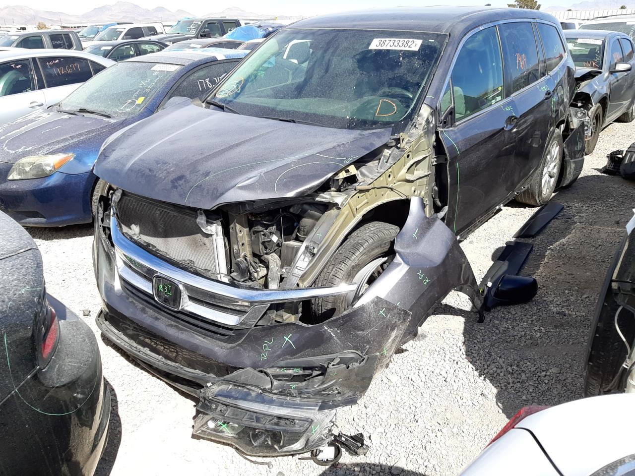 Photo 2 from auction – 2019 HONDA PILOT LX with VIN 5FNYF5H16KB004151