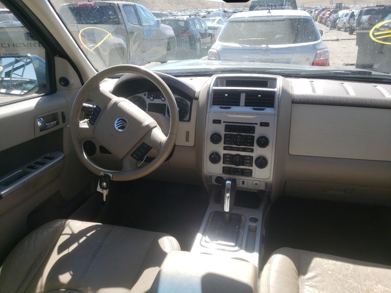 Photo 9 from auction – 2010 MERCURY MARINER PR with VIN 4M2CN9H7XAKJ25558