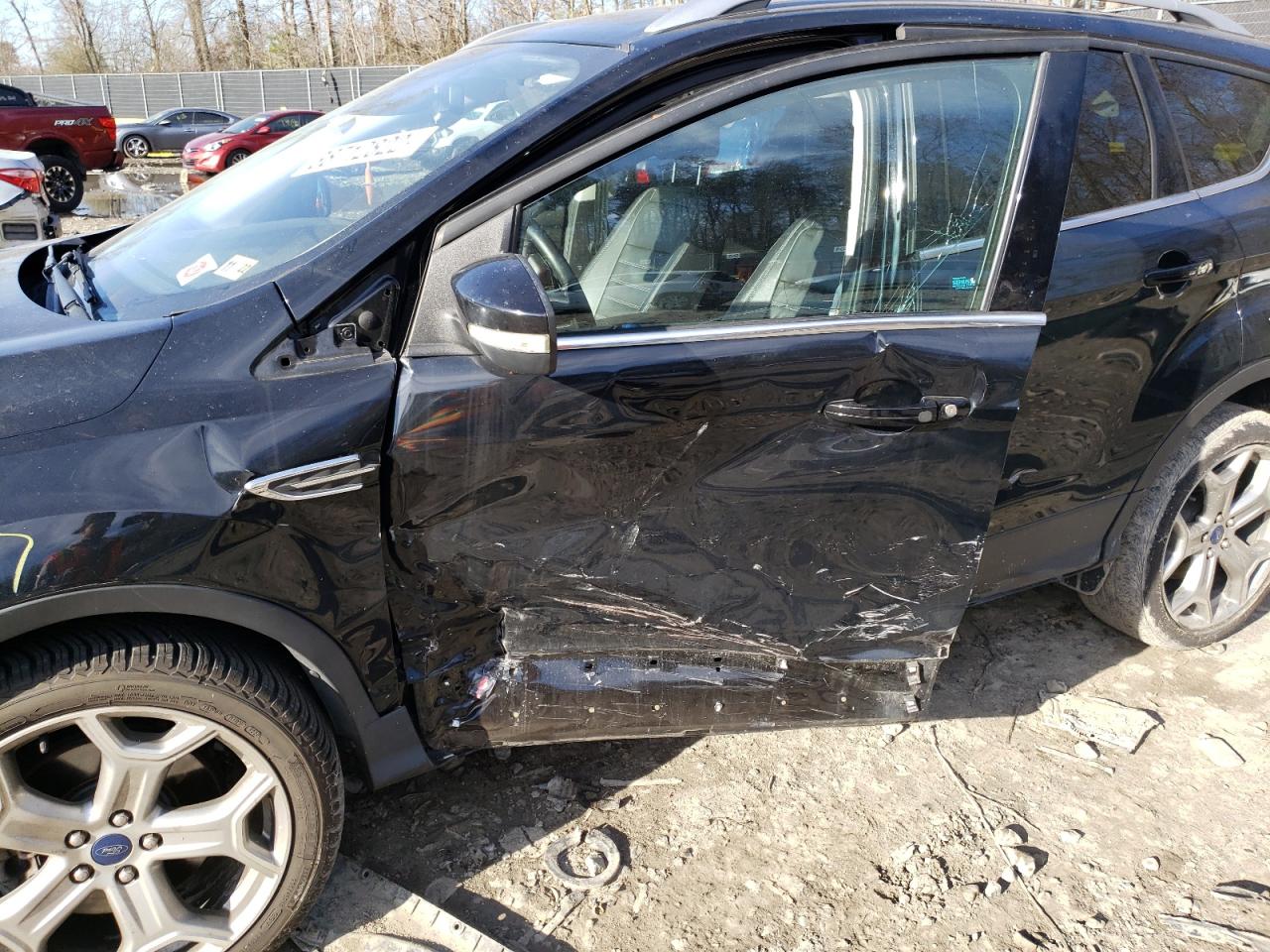 Photo 9 from auction – 2017 FORD ESCAPE TIT with VIN 1FMCU0J9XHUA60141