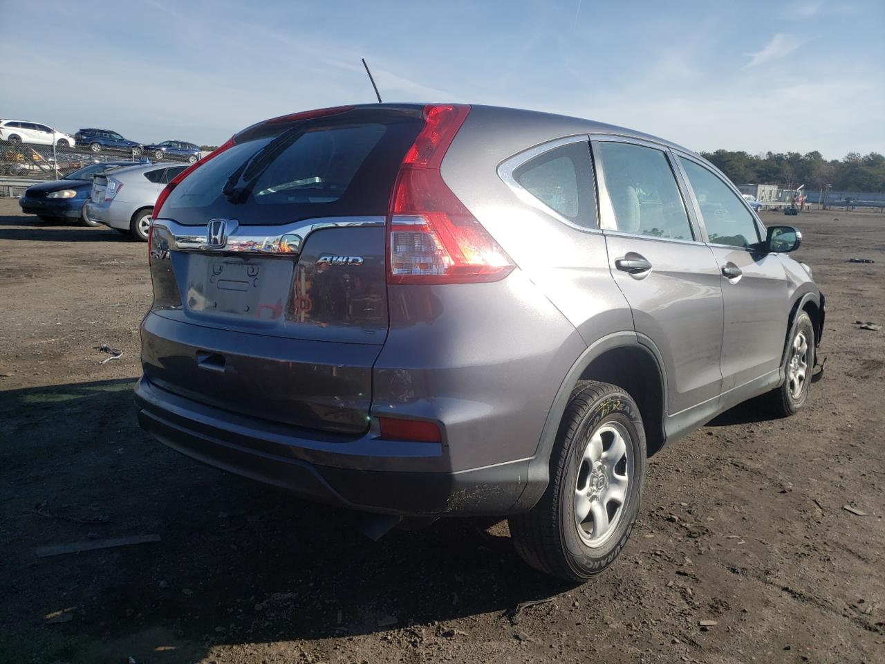 Photo 4 from auction – 2016 HONDA CR-V LX with VIN 2HKRM4H31GH637705