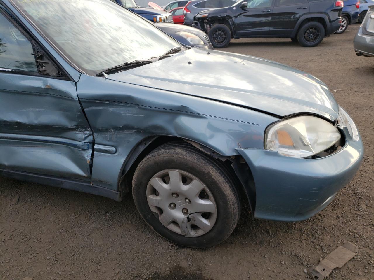 Photo 9 from auction – 2000 HONDA CIVIC BASE with VIN 2HGEJ6615YH573538