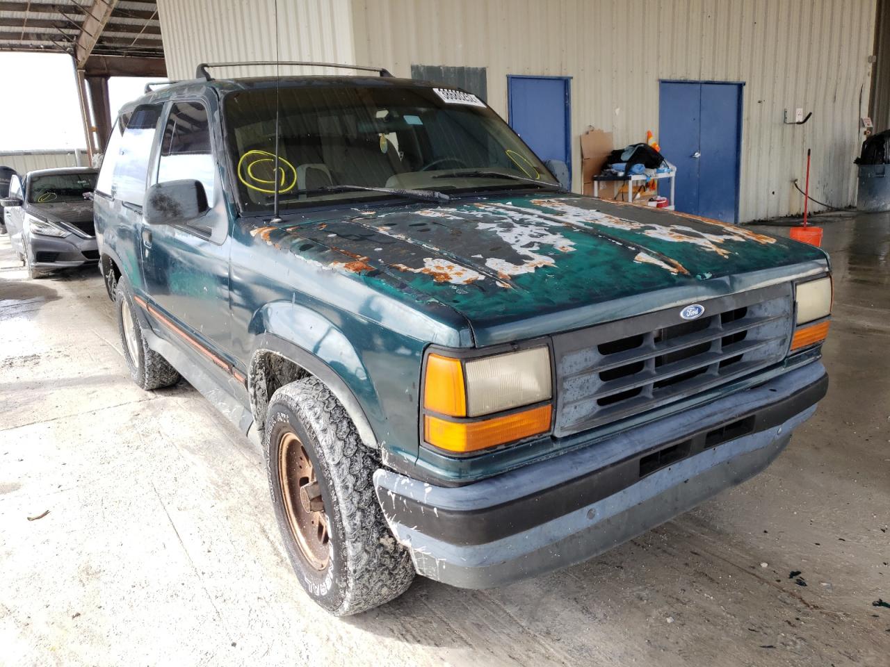 FORD EXPLORER 1993 with VIN 1FMCU22X8PUD68772 - Photo from auction