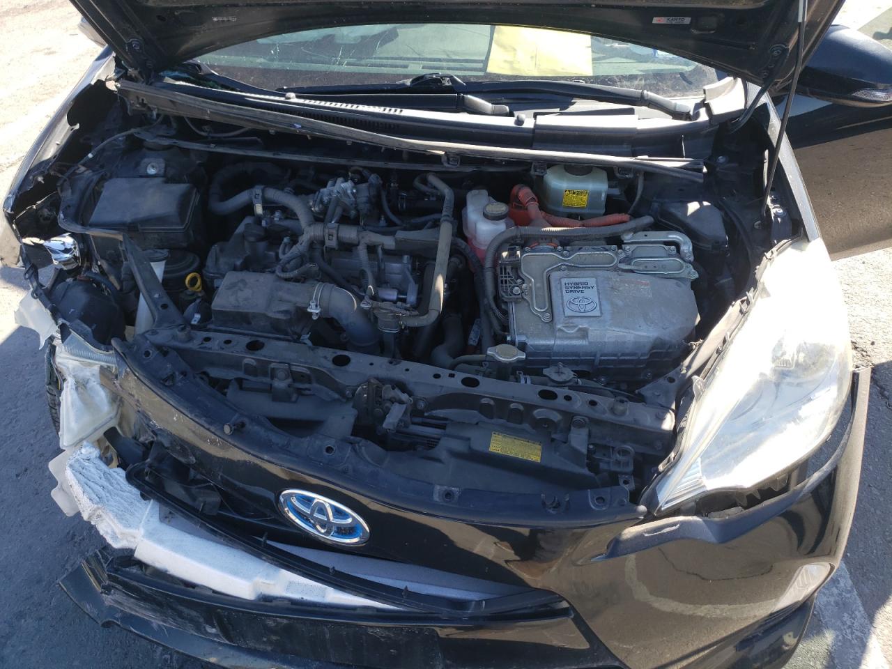 Photo 7 from auction – 2012 TOYOTA PRIUS C with VIN JTDKDTB35C1007756