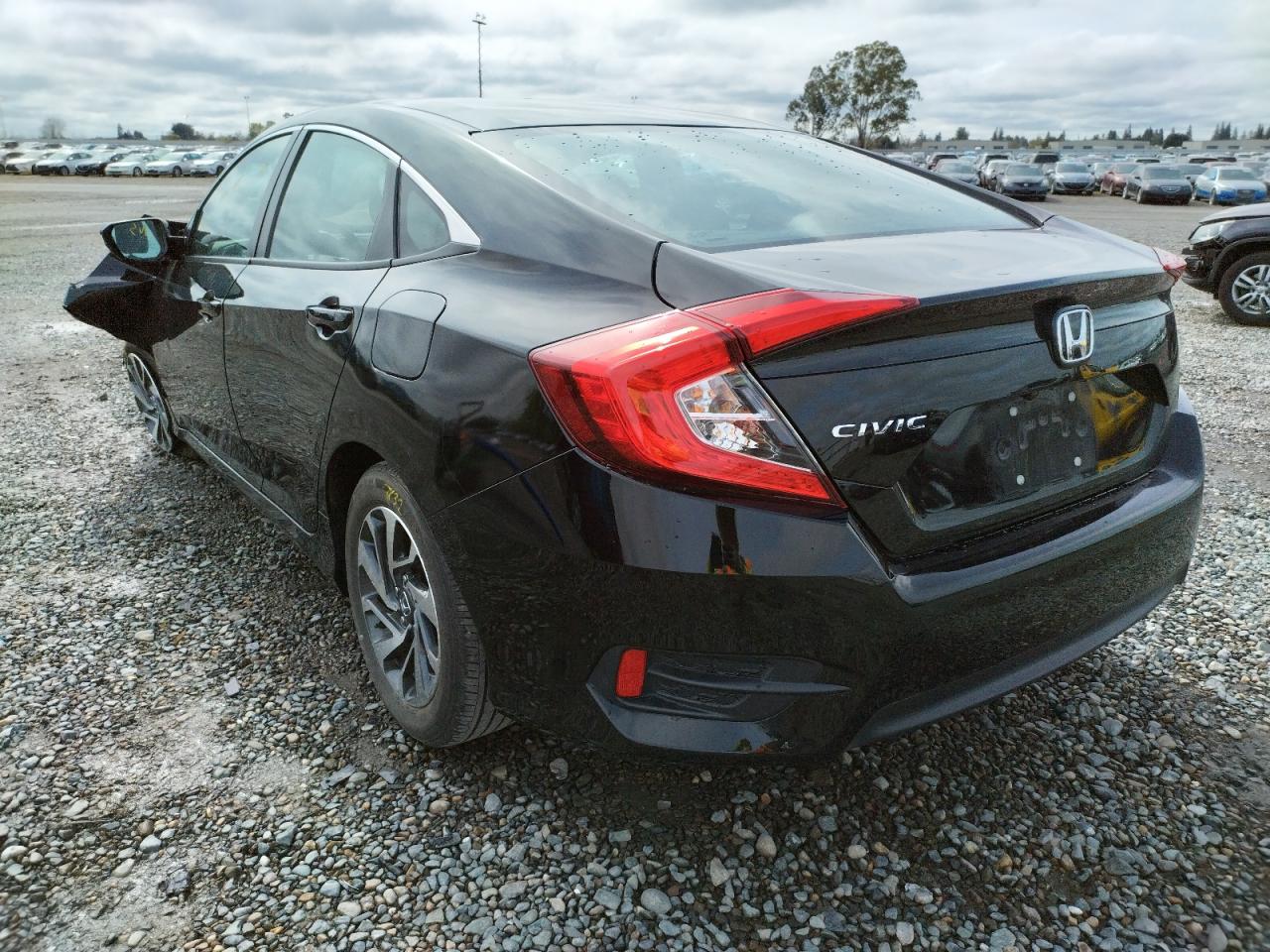 Photo 3 from auction – 2016 HONDA CIVIC EX with VIN 2HGFC2F70GH571657